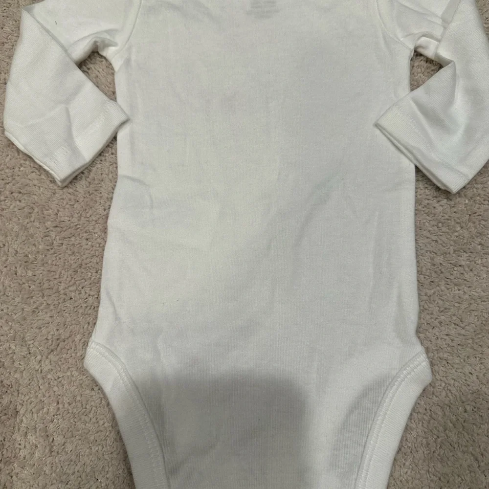 Janie and Jack knit shorty and Carter's long sleeve onesie